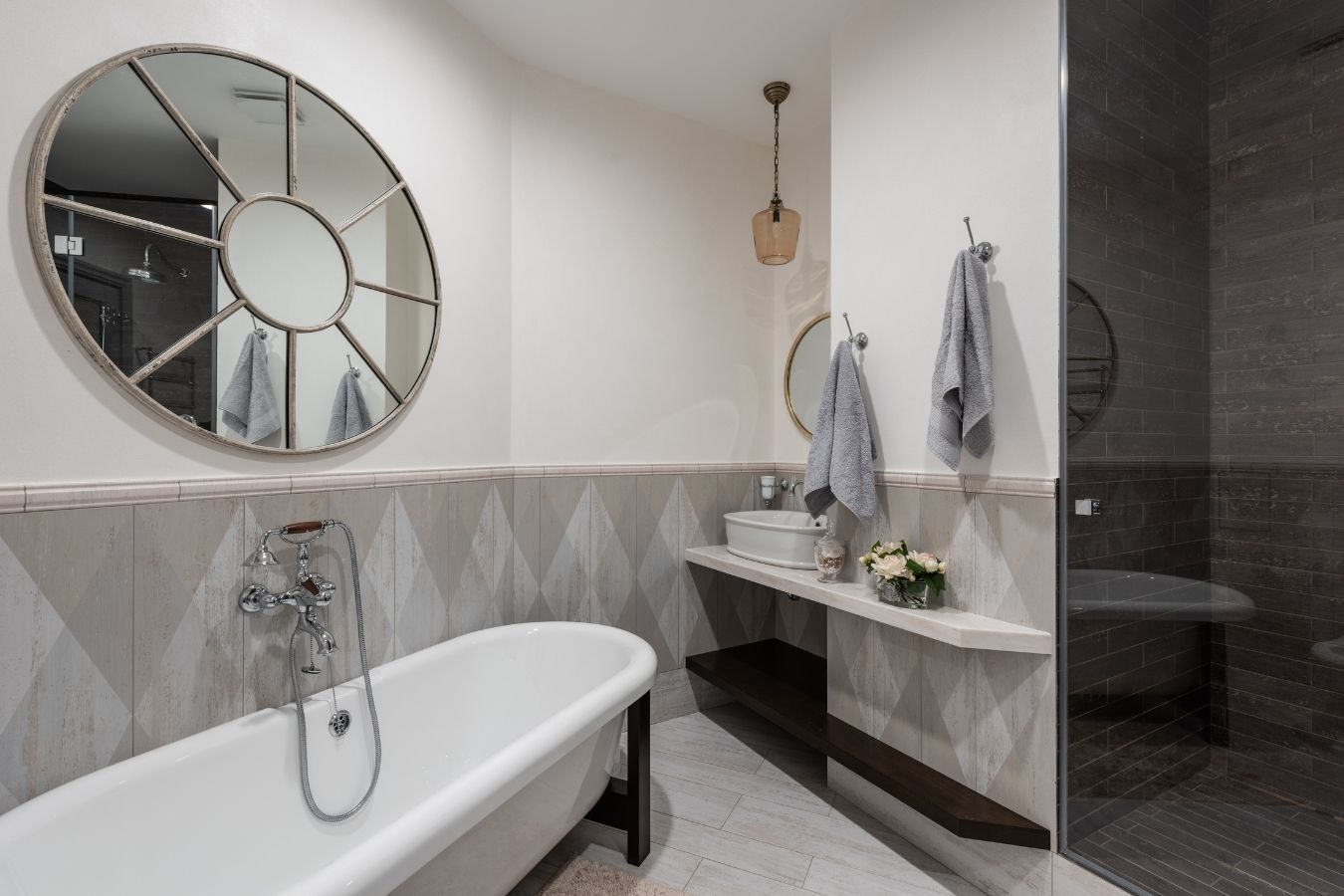 Bathroom floor tiling detail with herringbone pattern