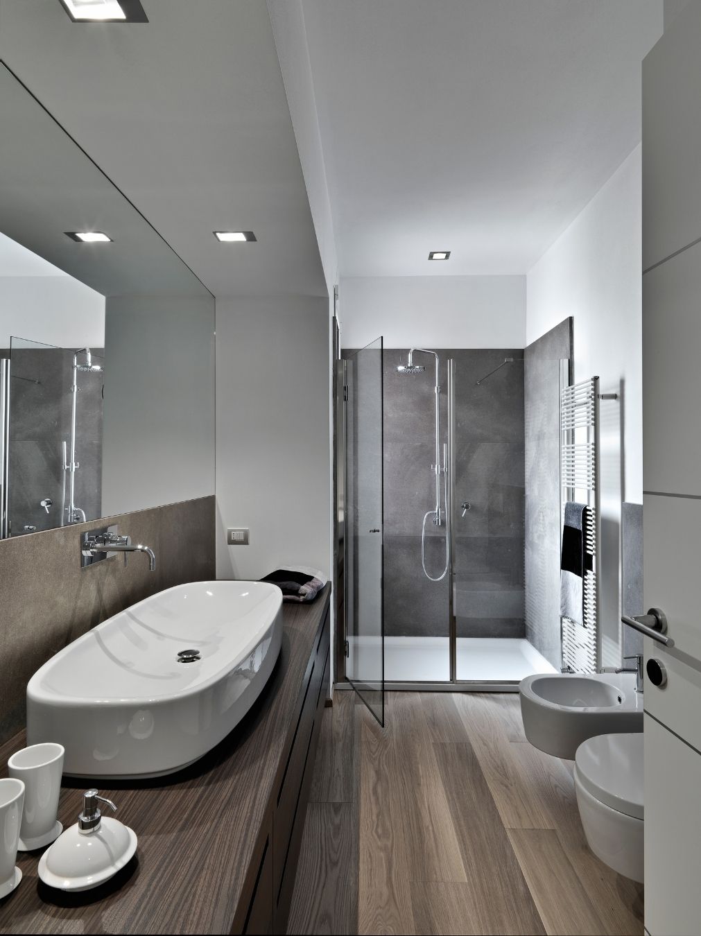 Completed full bathroom renovation with vanity, freestanding bath and walk-in shower
