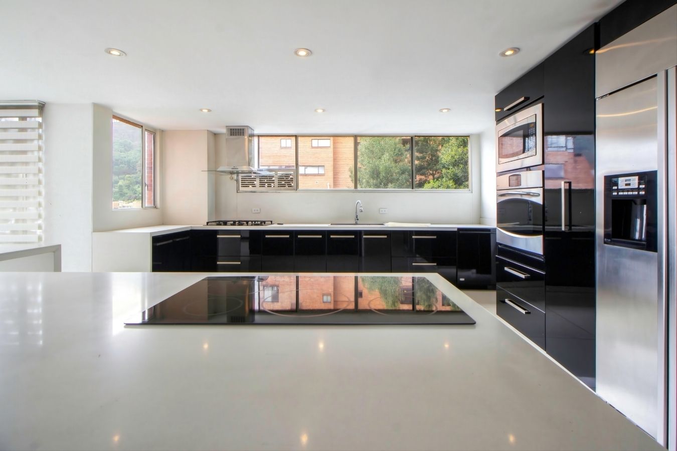 Kitchen with feature lighting and open layout